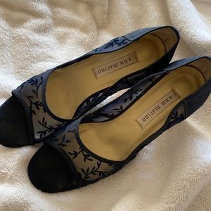 Elegant Navy Blue flattering open toe heels.